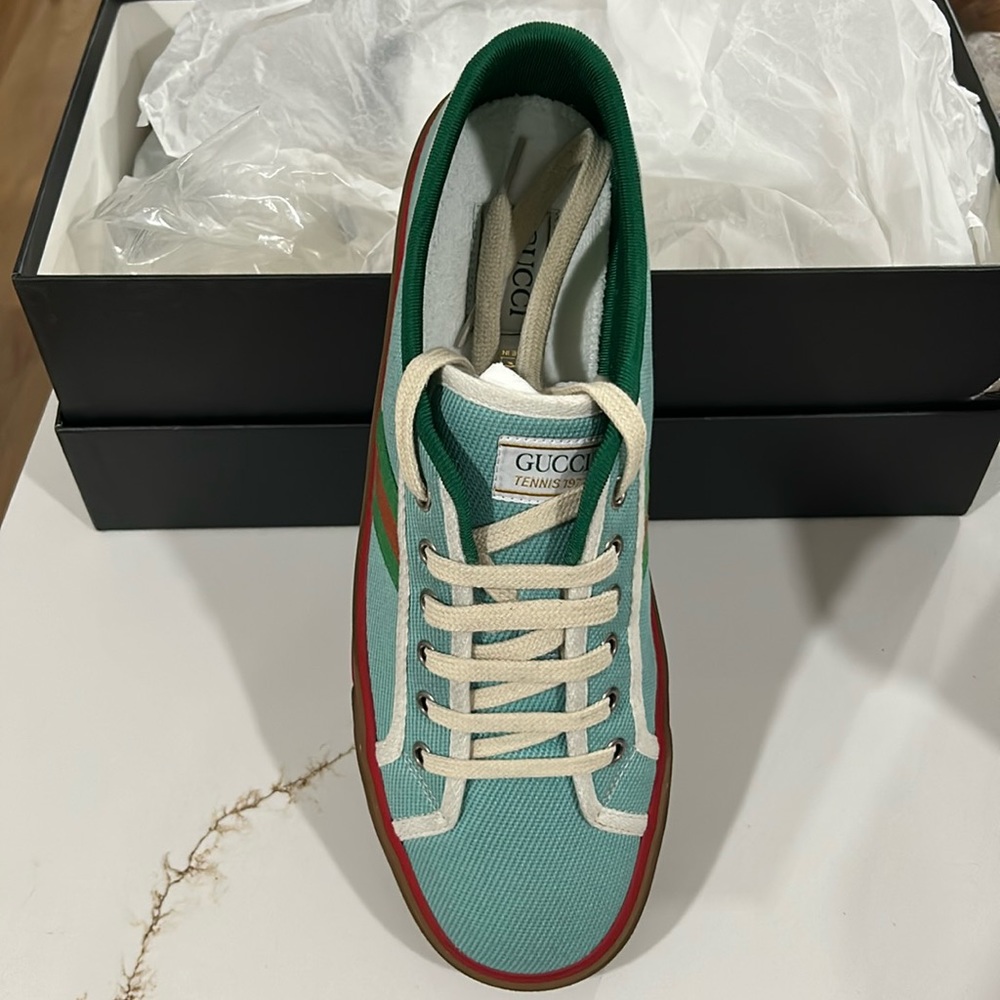 Gucci size 9.5 tennis sneaker, fits like size 10-10.5 (Gucci sneakers run big)